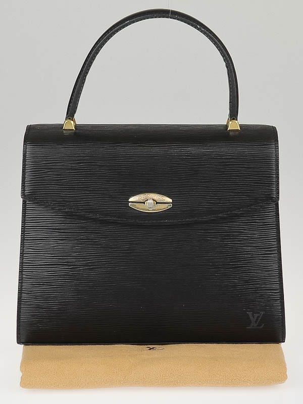 I've had my eye on a vintage LV Malesherbes purse but managed to