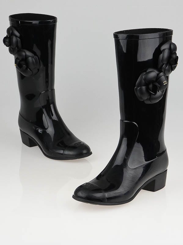 Lori Harvey Slips On Chanel Rain Boots With Leggings  Cropped Puffer   Footwear News