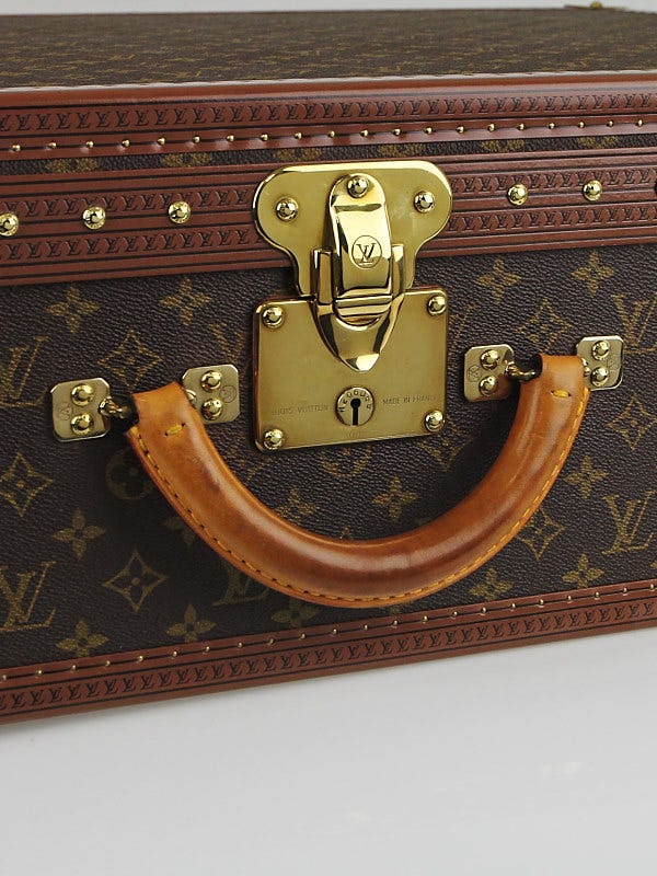 Lot - A Louis Vuitton monogram canvas hard sided Alzer 80 suitcase
