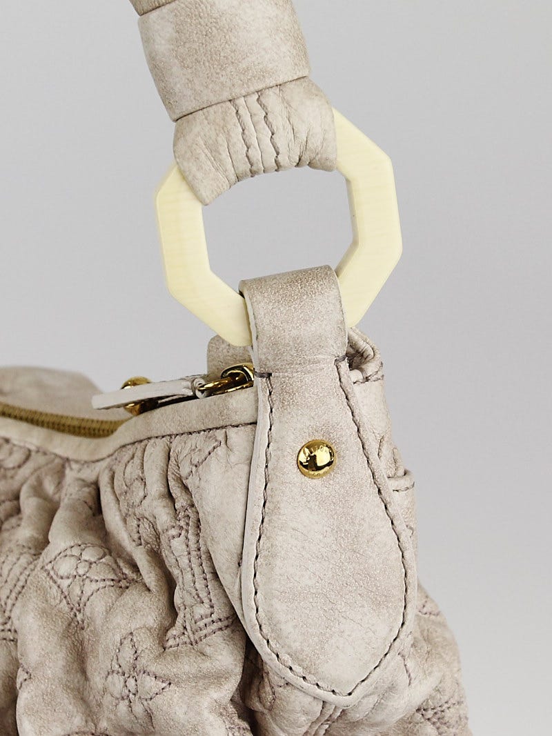 Louis Vuitton Olympe Nimbus Top Handle Bag Beige Emprainte Leather