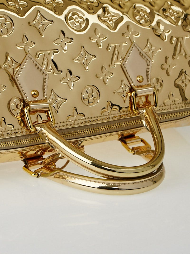 Sold at Auction: Louis Vuitton Gold Mirror Patent Leather Speedy 30