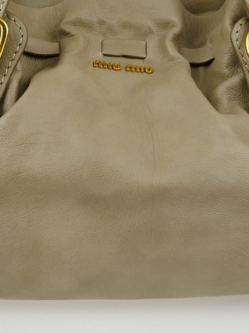 Miu Miu Vitello Lux Large Bow Bag, $1,660, Saks Fifth Avenue