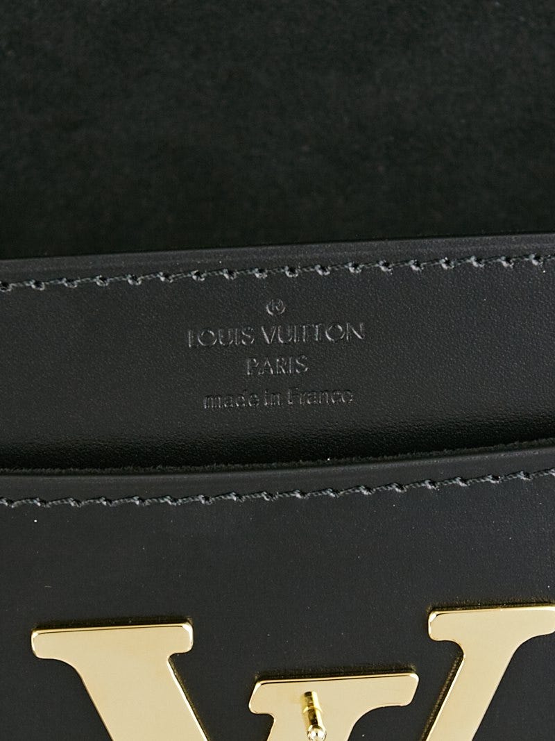 LOUIS VUITTON, a black leather ' Chain Louise MM' bag, 2015. - Bukowskis