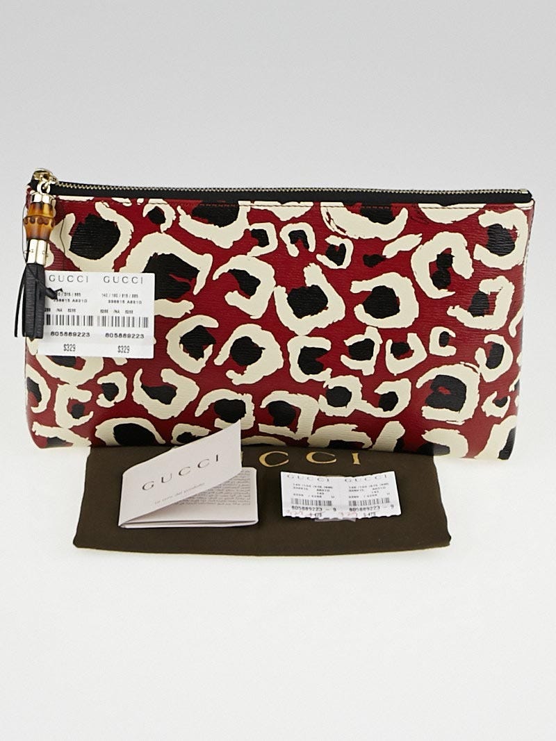 Gucci print clutch online