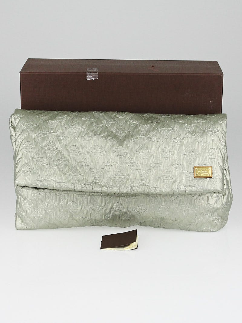 Limelight leather clutch bag Louis Vuitton Silver in Leather