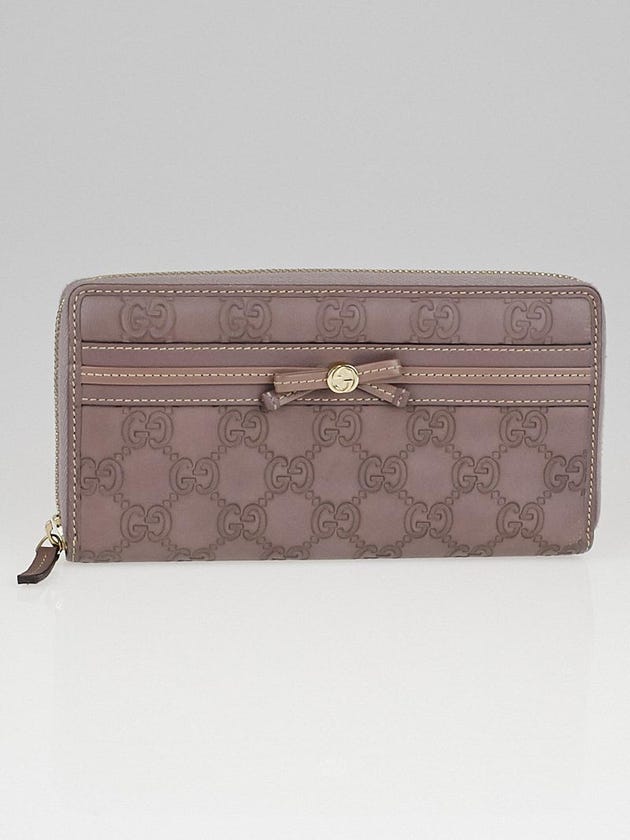 Gucci Mauve Guccissima Leather Bow Zip Around Wallet