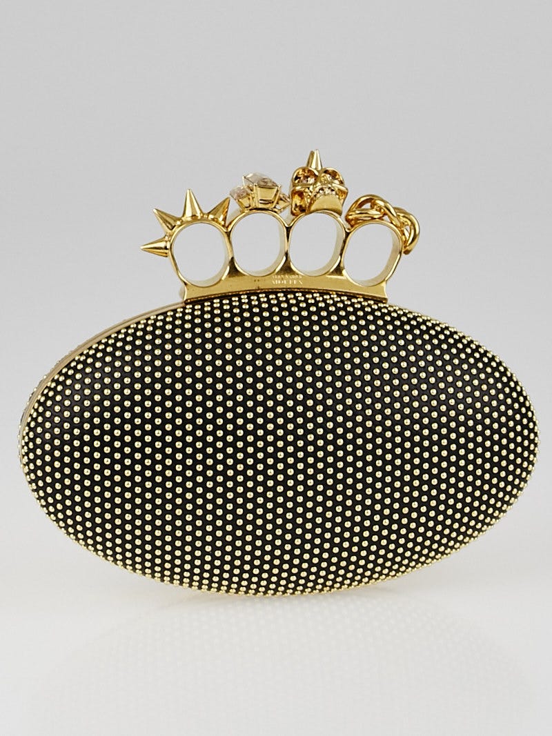 Gold studded clutch discount bag