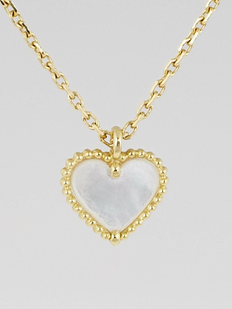 Van cleef and arpels heart necklace on sale