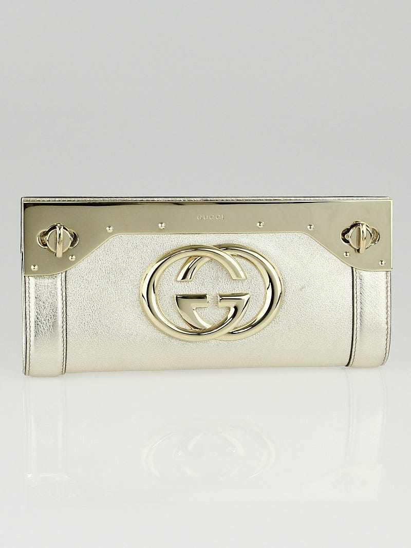 Gucci gold clutch bag deals