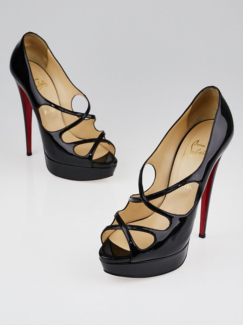 Louboutin criss cross heels top