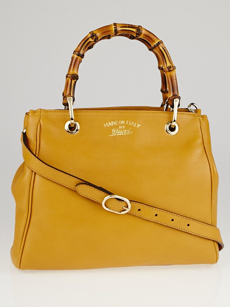 Gucci bag with yellow handle 2025
