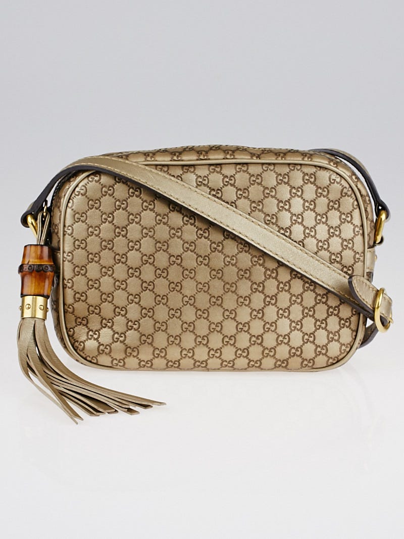 Gold gucci disco bag top
