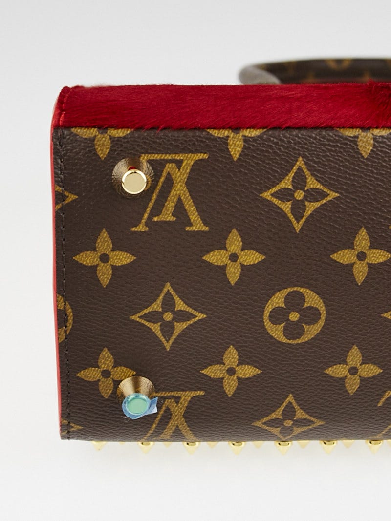 12  Louis Vuitton Monogram Canvas and Calfhair Iconoclasts