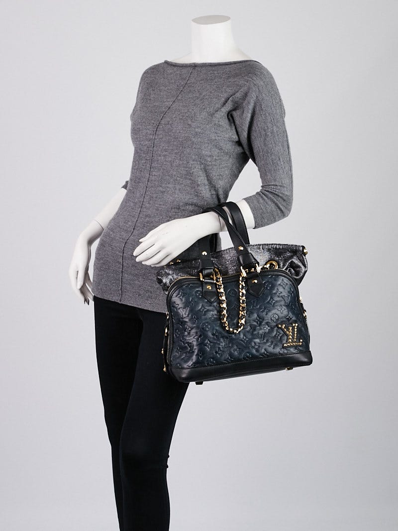 Louis Vuitton Double Jeu Leather Handbag