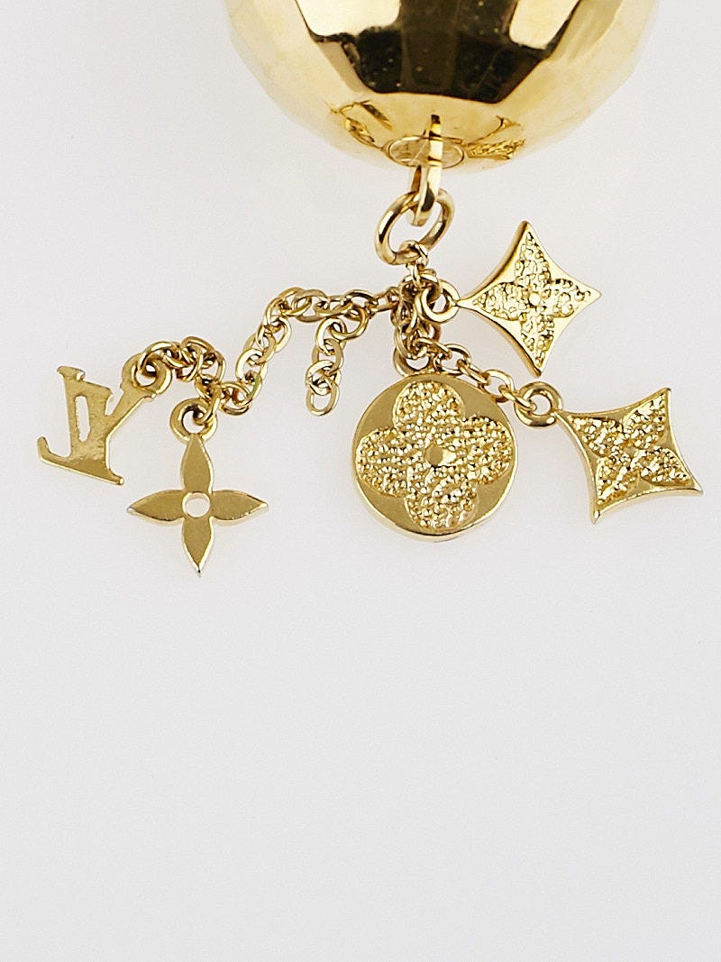 Louis Vuitton Gold Glitter Mirror Ball Key Chain Golden Metal ref.313117 -  Joli Closet