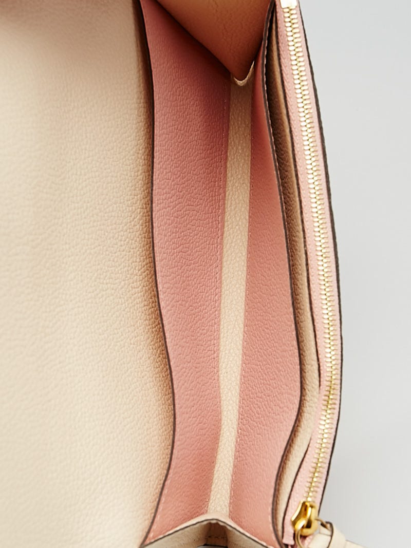Louis Vuitton Rose Poudre Monogram Empreinte Leather Emilie Wallet -  Yoogi's Closet