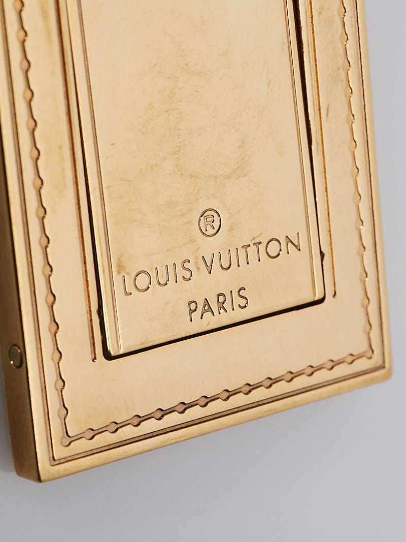 Monogram bag charm Louis Vuitton Gold in Metal - 32536079