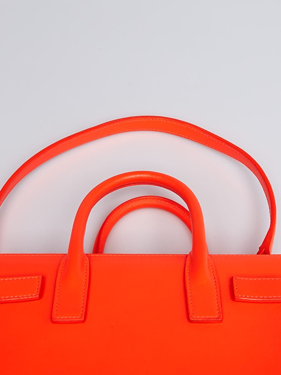 Saint Laurent Sac de Jour nano bag in fluorescent orange leather