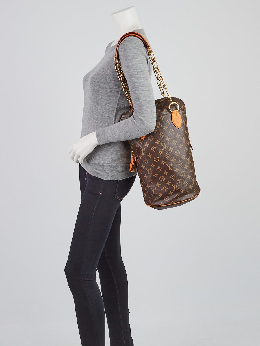 Louis Vuitton 2014 Pre-owned Monogram Punching Bag Baby Handbag - Brown
