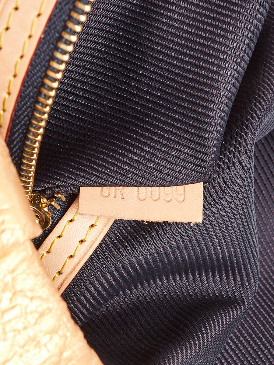 Louis Vuitton Limited Edition Gold Monogram Limelight African