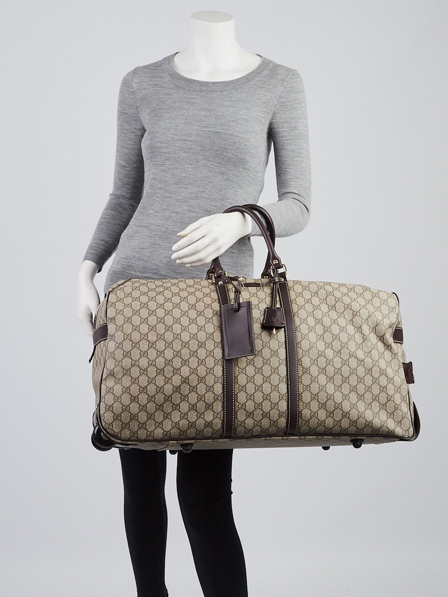 Gucci rolling duffle outlet bag