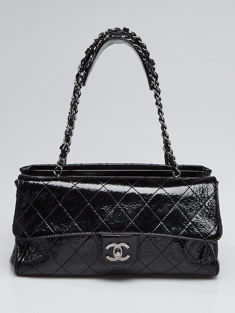 black chanel handbag with white logo