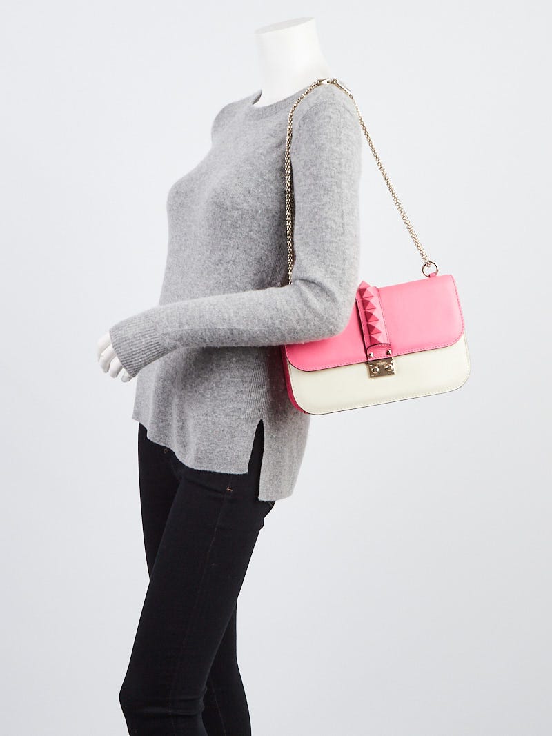 Valentino Pink Rockstud Flap Bracelet Leather Clutch bag Pony-style  calfskin ref.990968 - Joli Closet