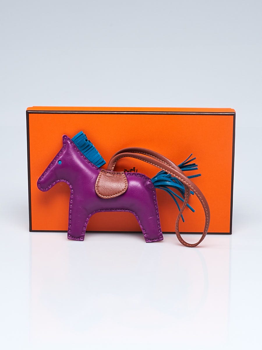 Hermes Kelly bag in Anemone + Rodeo horse charm.