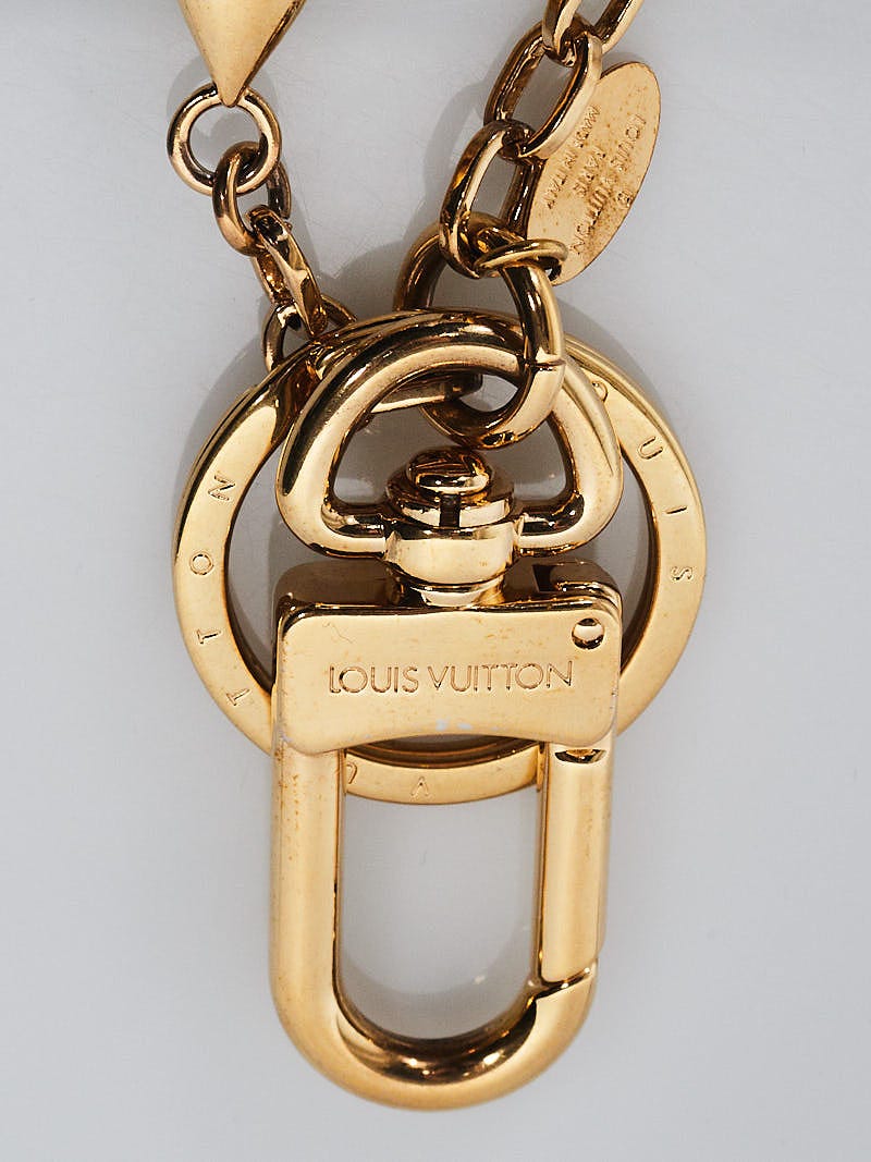 Louis Vuitton Goldtone and Silvertone Metal LV Twist Key Holder