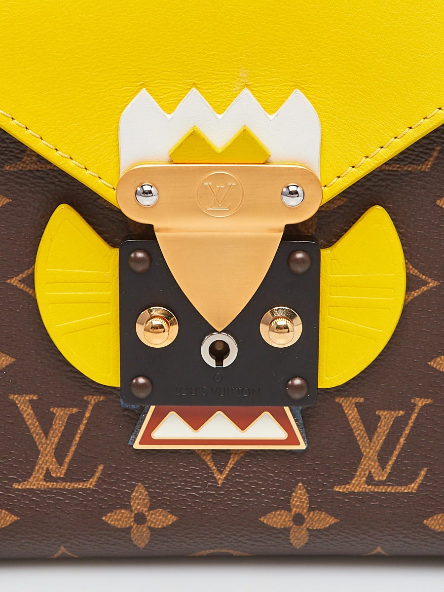 Louis Vuitton Tribal mask yellow chain crossbody bag, Luxury, Bags &  Wallets on Carousell