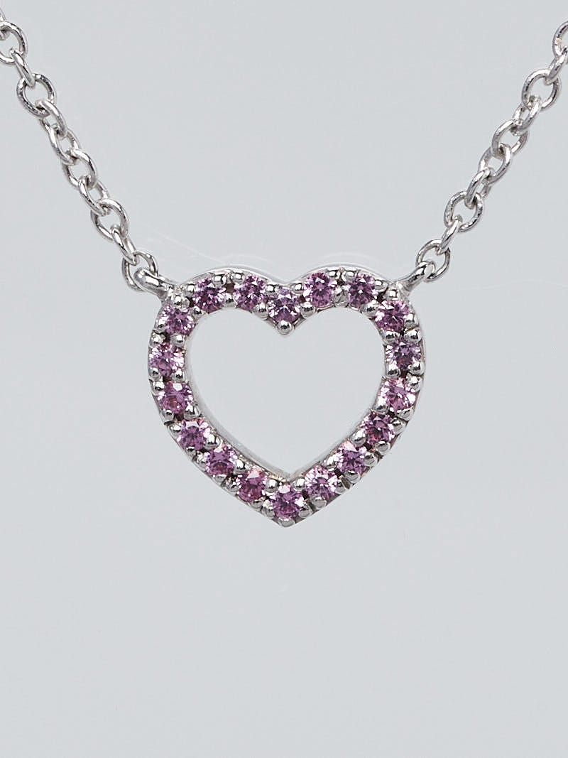 Elsa Peretti™ Open Heart pendant in sterling silver with a pink sapphire. |  Tiffany & Co. Singapore