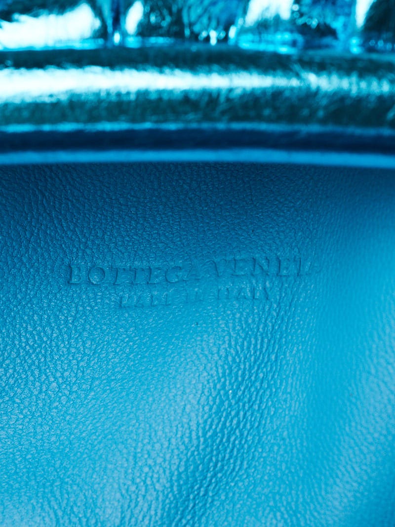 Bottega Veneta metallic mini pouch 1195.00