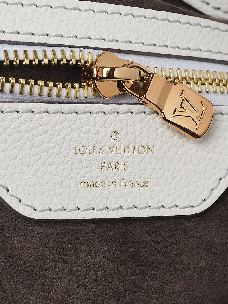 Louis Vuitton Beige Perforated Monogram Mahina Leather XL Bag. Very, Lot  #58346