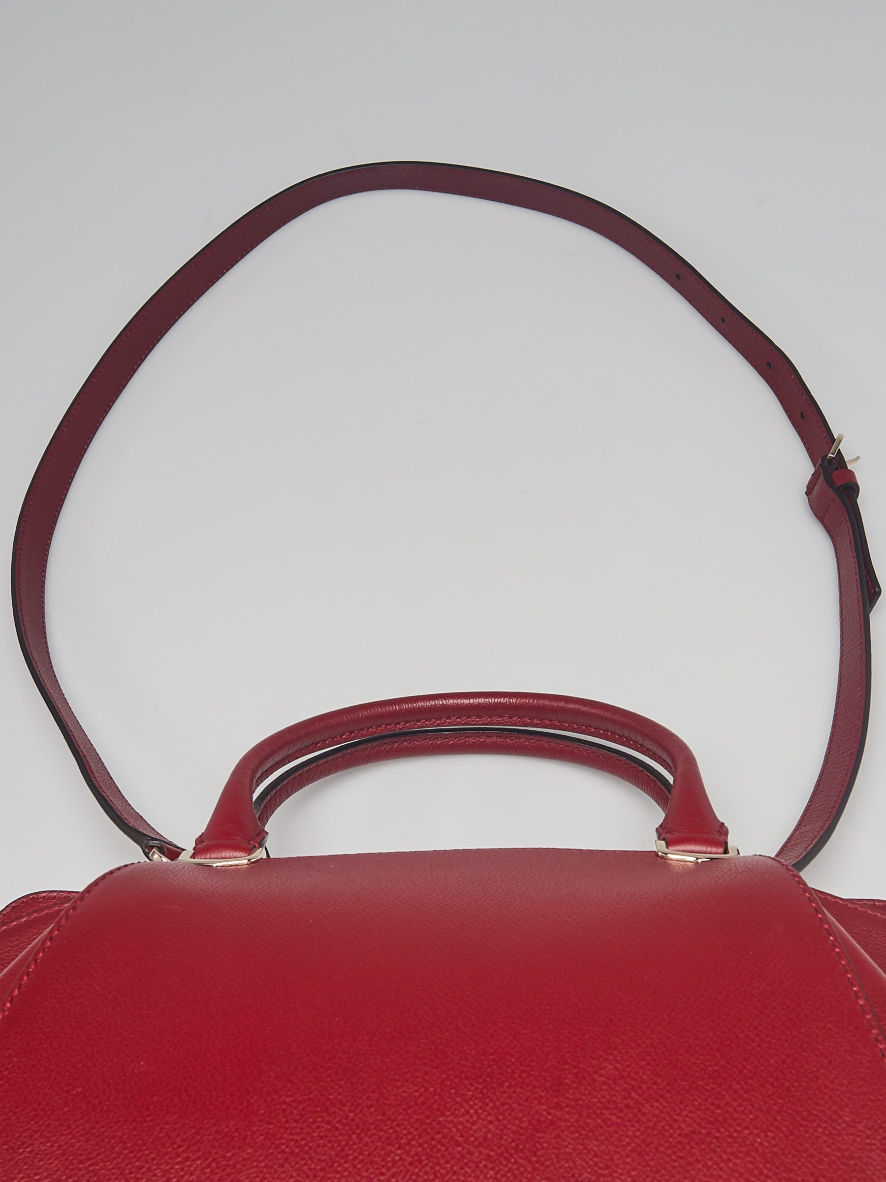 C de Cartier bag, small model - Rhodolite garnet taurillon leather