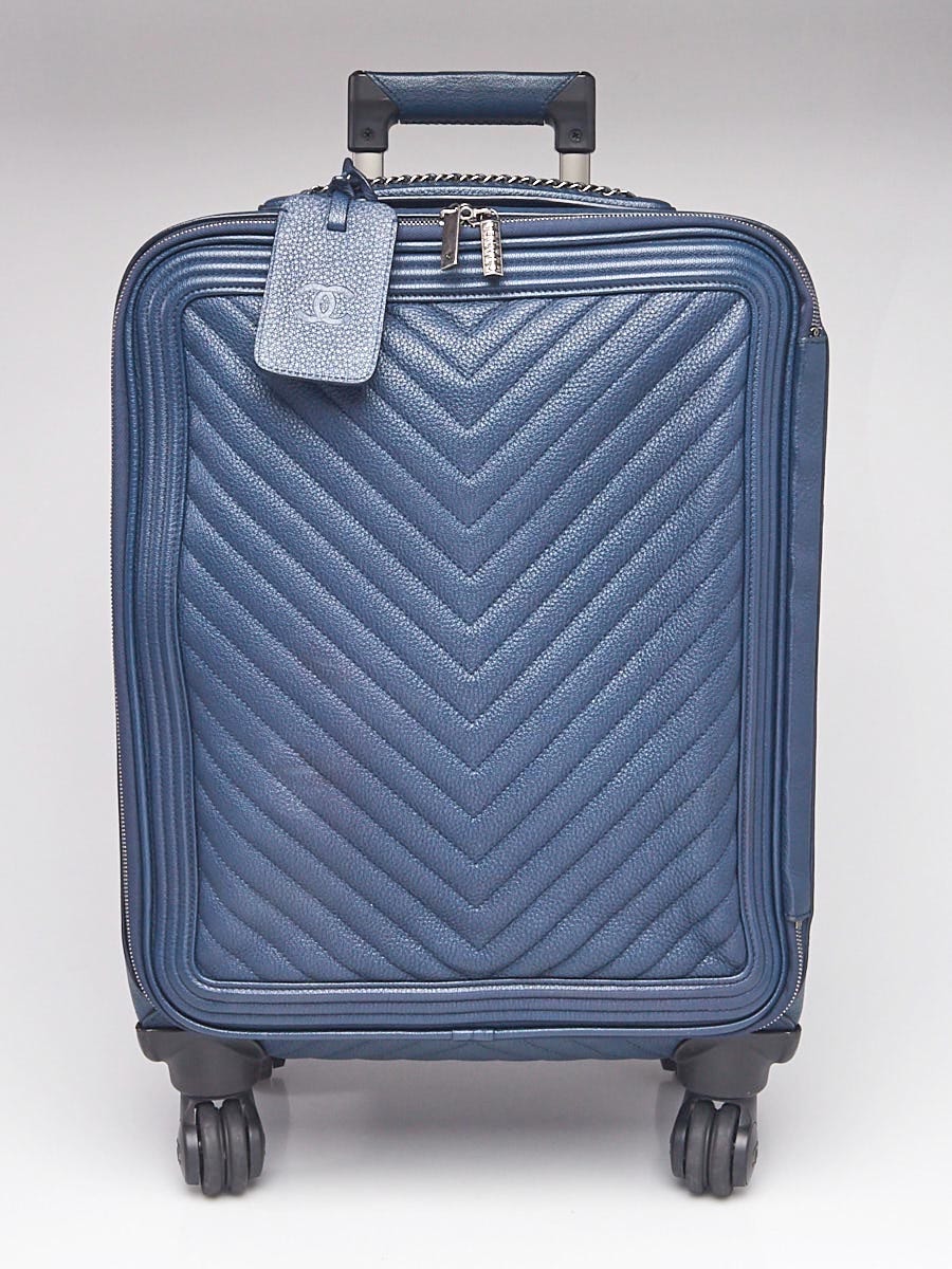 Chanel on sale rolling luggage