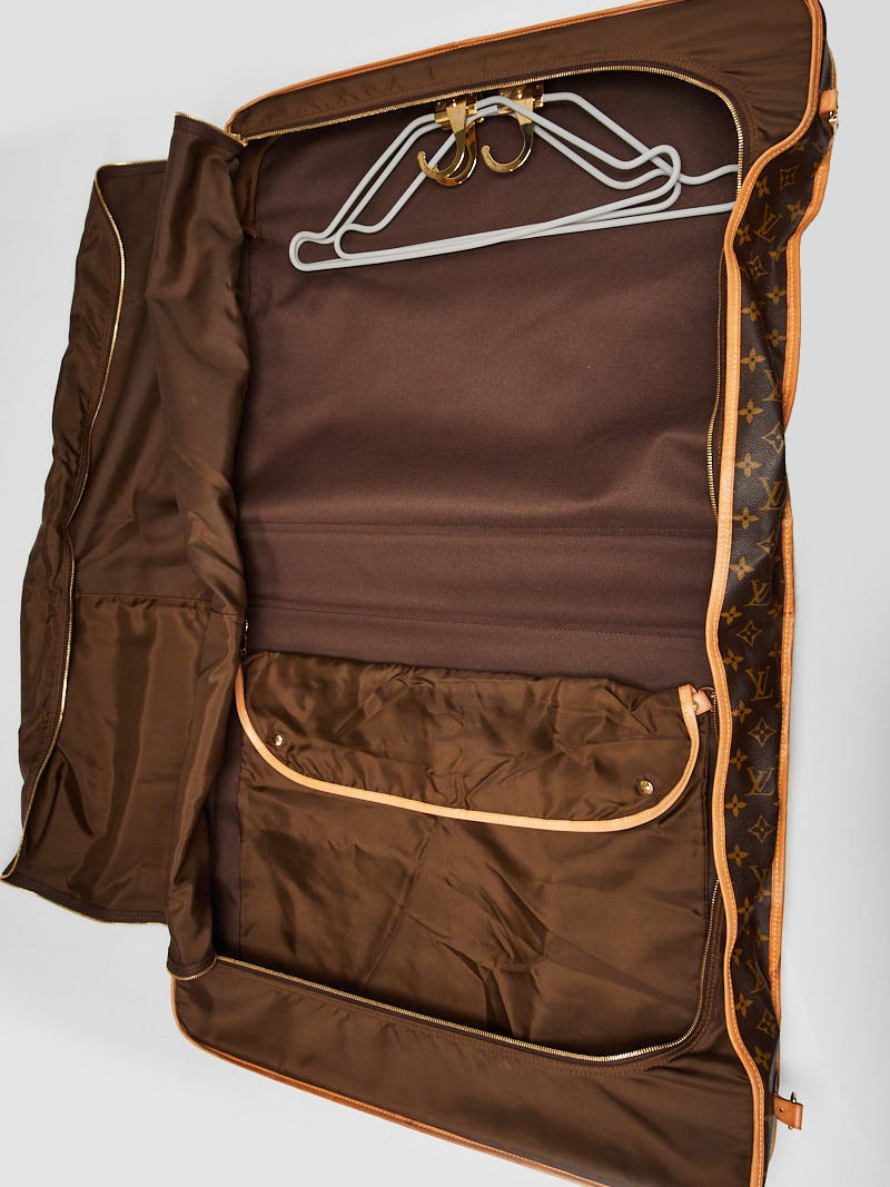 Louis Vuitton - travel bag - clothes rack