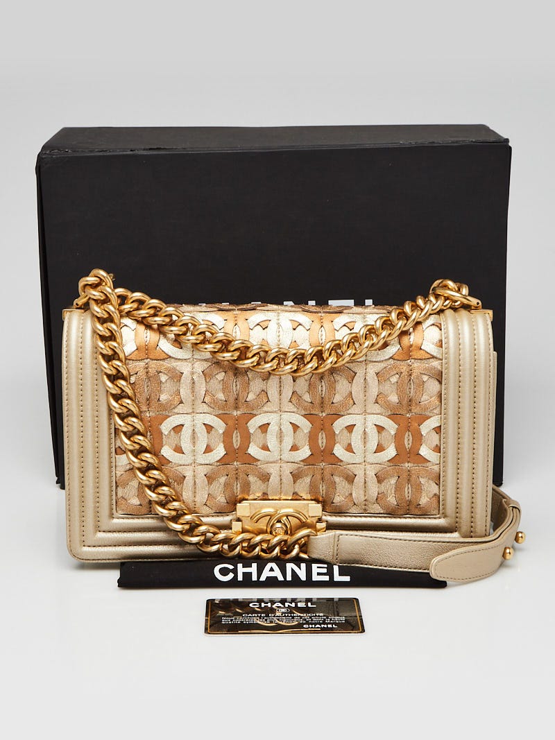 CHANEL, GOLD METALLIC LIMITED EDITION SMALL BOY BAG IN LAMBSKIN WITH CC  CUT-OUT DETAILING AND GOLD TONE HARDWARE, 2015, Handbags and Accessories, 2020