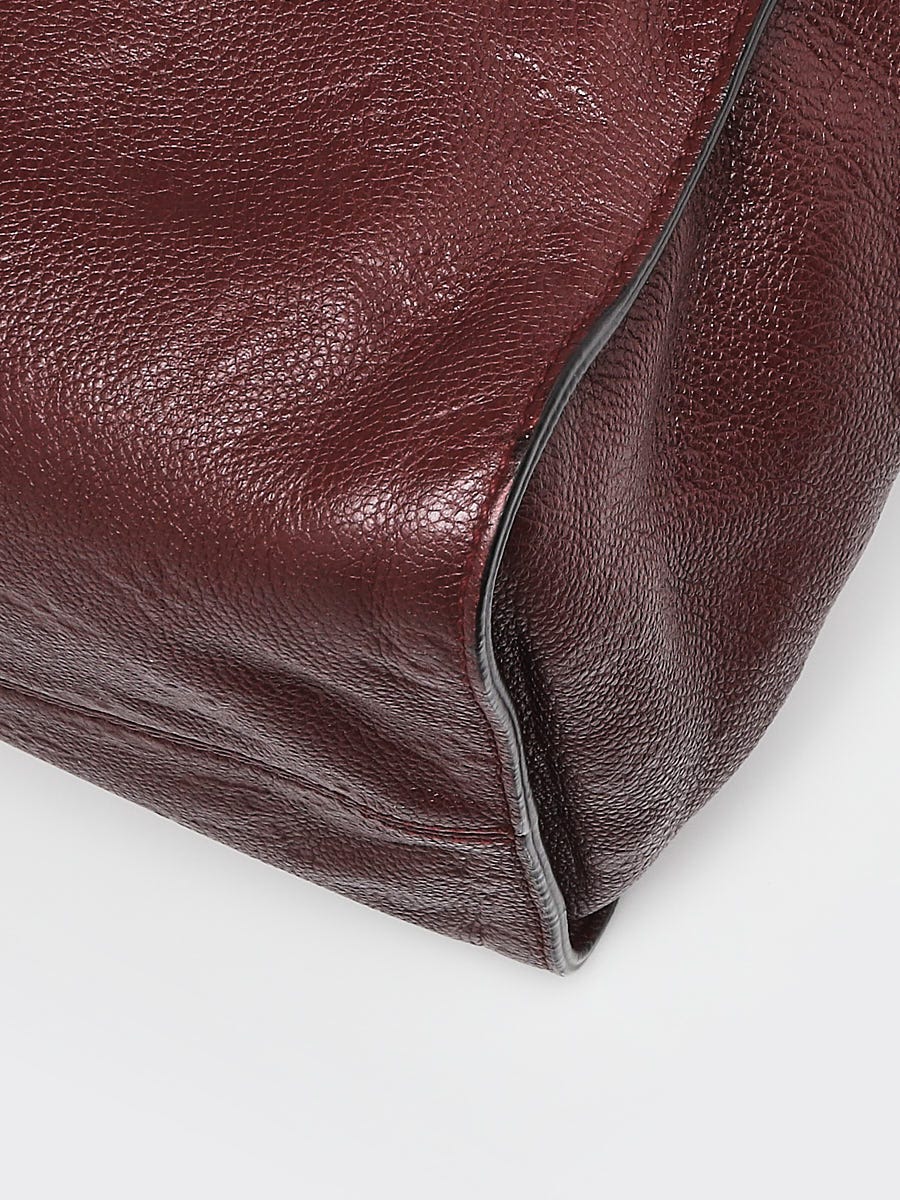 Louis Vuitton Flamme Monogram Empreinte Leather PM Bag