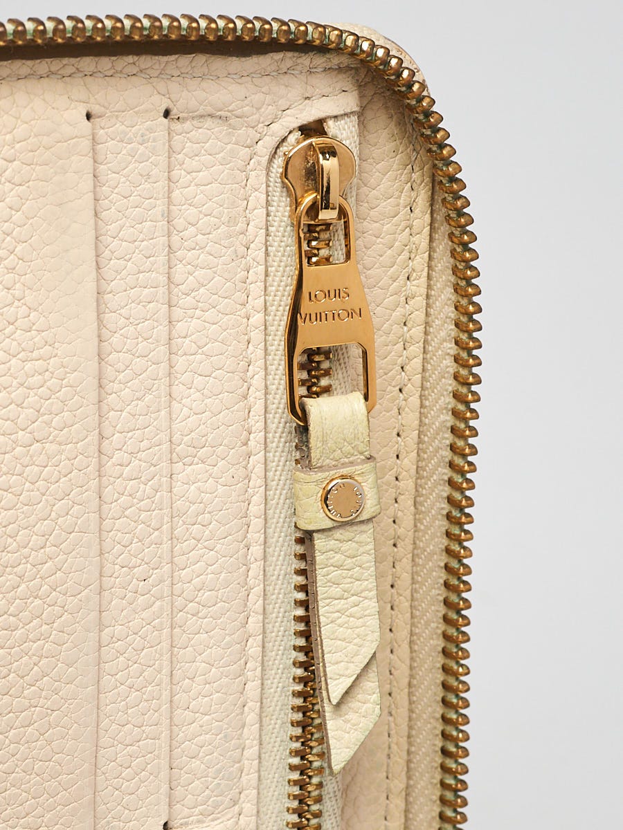 Authentic Louis Vuitton Ivory Empreinte Leather Long Zippy Wallet