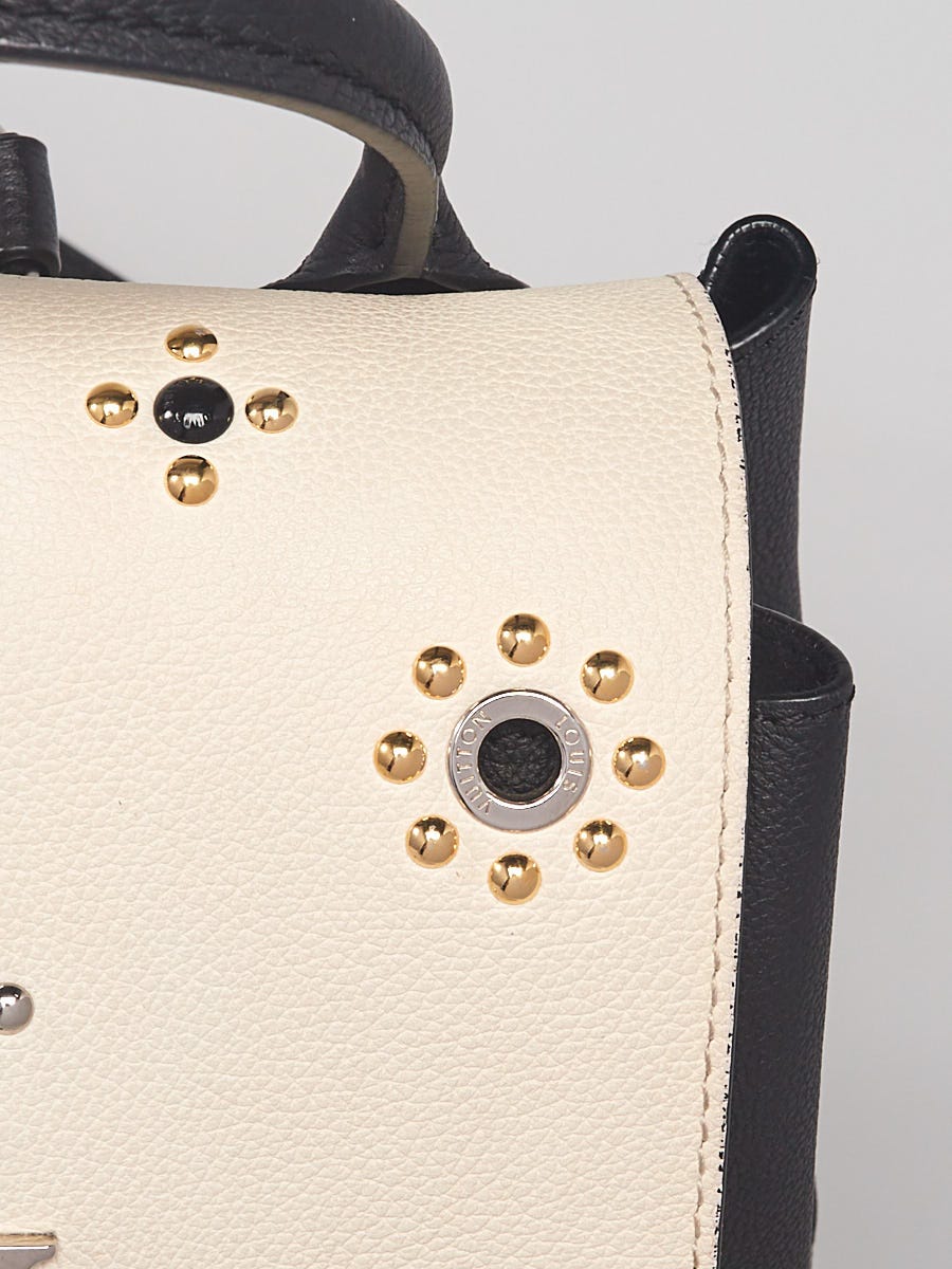 Louis Vuitton Lock Me II Mechanical Flower Handbag White Pony-style  calfskin ref.780114 - Joli Closet
