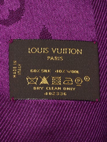 LOUIS VUITTON, a pair of black wool and silk pants.Size 40