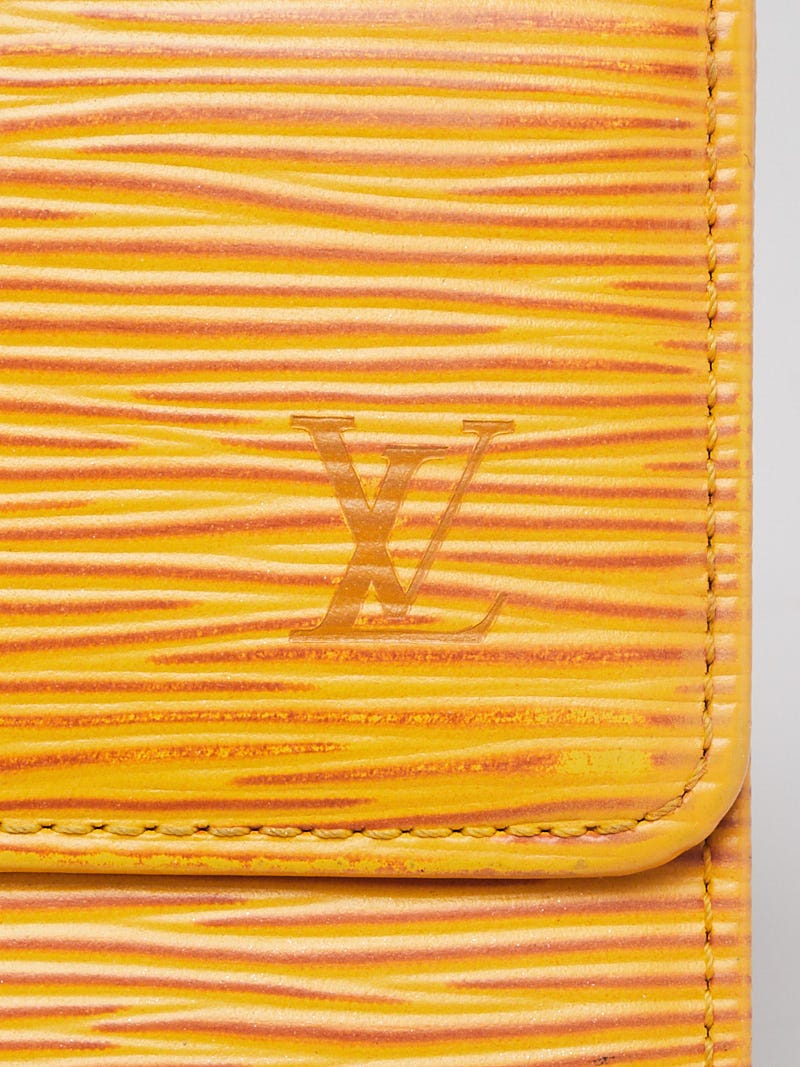 LOUIS VUITTON - Yellow epi leather wallet, snap closure…