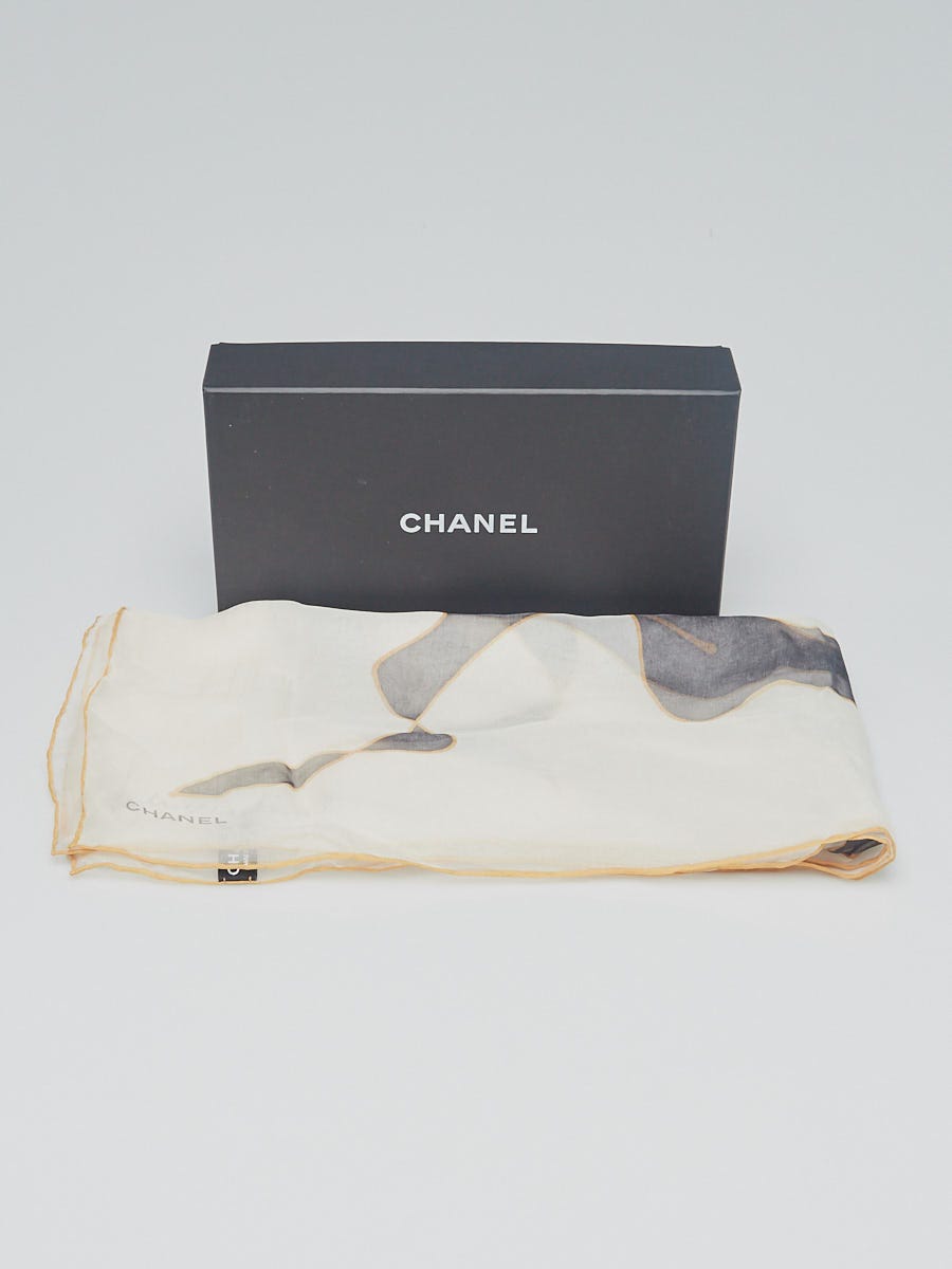 Chanel A Small Silk Scarf. A Black Scarf With A White