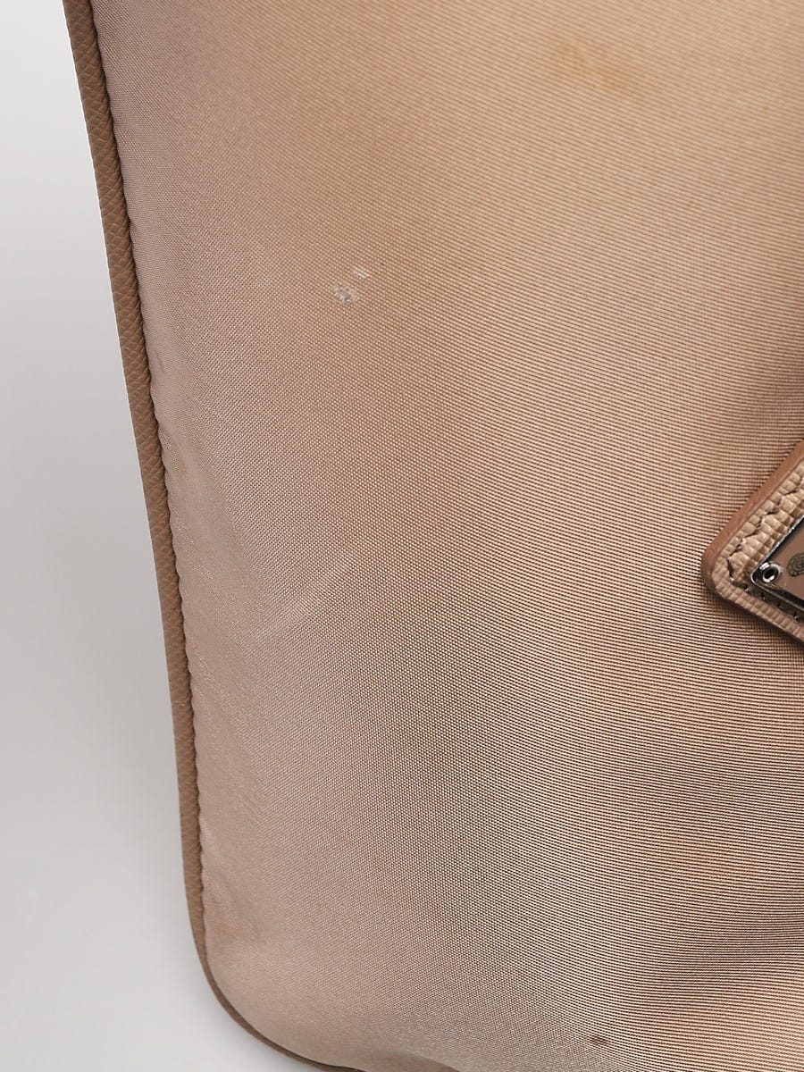 Shop PRADA Re-edition 2005 saffiano leather bag (1BH204_NZV_F02EN_V_V2M,  1BH204_NZV_F0632_V_V2M) by SARUGAKUCHO