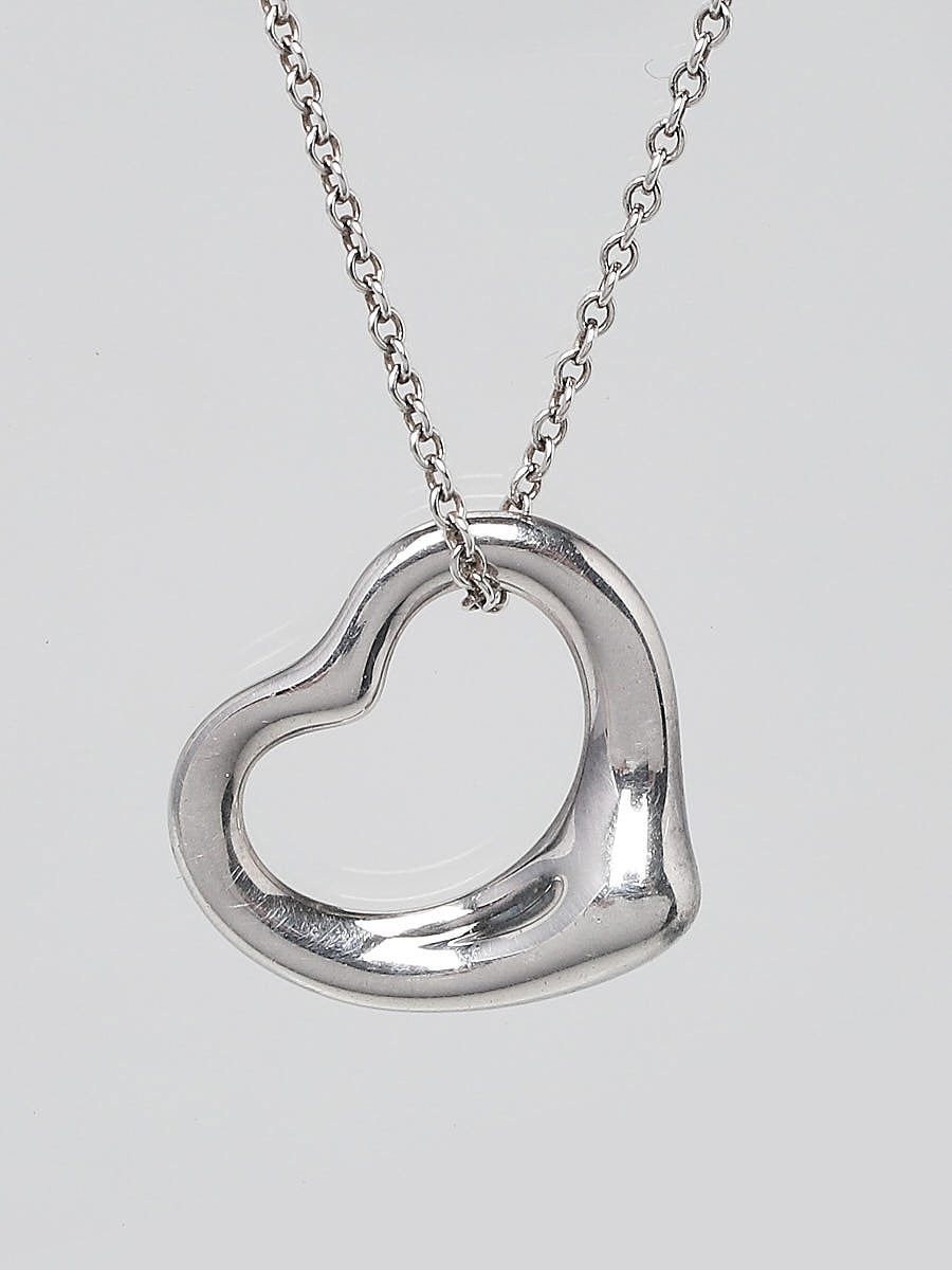 Return to Tiffany™ medium heart tag with key pendant in sterling silver. |  Tiffany & Co.