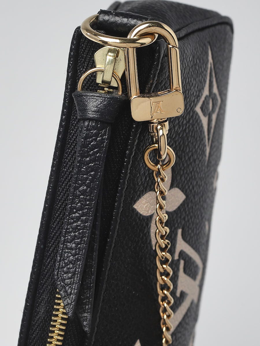 Louis Vuitton Bi-Color Black/Cream Giant Monogram Empreinte Leather Mini  Accessories Pochette Bag - Yoogi's Closet