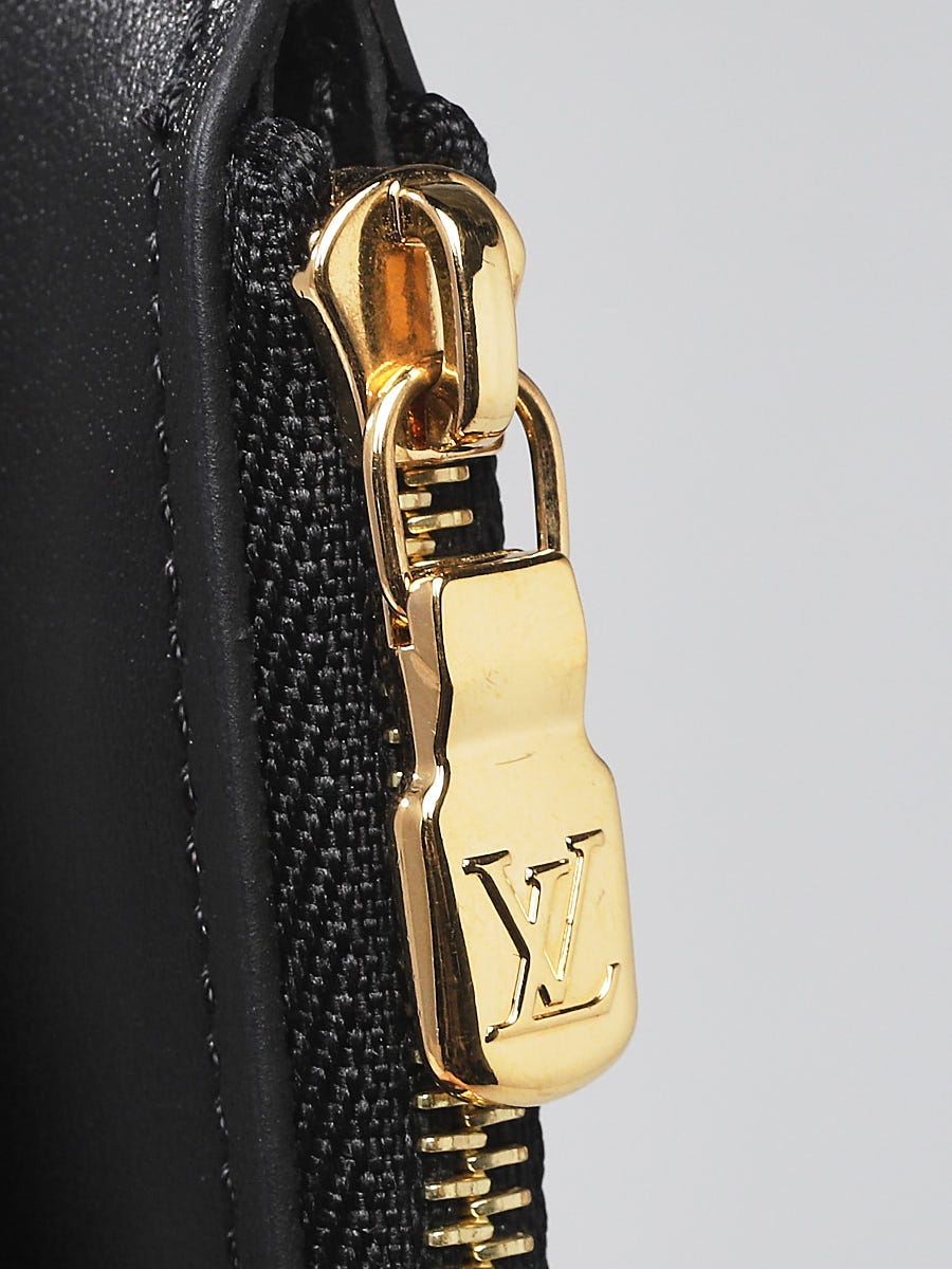 Louis Vuitton Slim Purse Monogram Canvas - ShopStyle Clutches