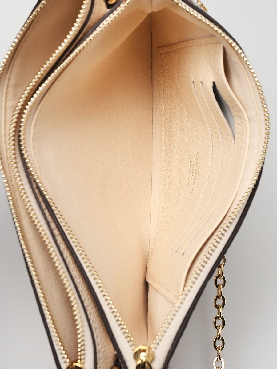 Louis Vuitton Double Zip Pochette Monogram Empreinte Leather with Python at  1stDibs  lv double zip pochette, louis vuitton snake wallet, double zip  pochette louis vuitton