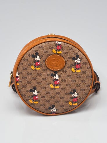 gucci disney mini backpack x GG Supreme Round Bag Beige Disney and Gucci come together for an exclusive collection Gucci x Disney Brown GG