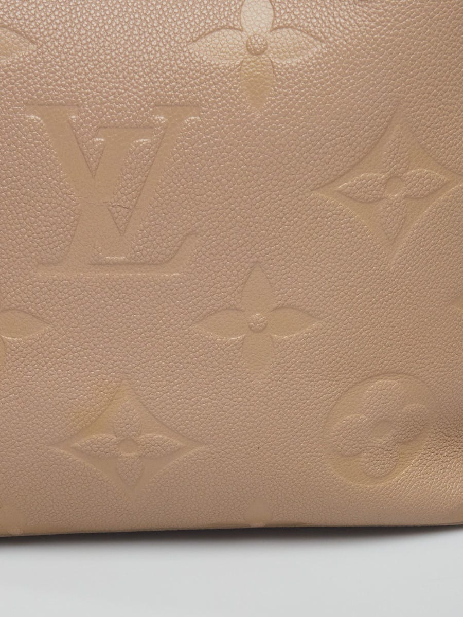 Authentic Louis Vuitton Turtledove Monogram Empreinte Leather Neverfull MM  Shoulder Tote – Italy Station
